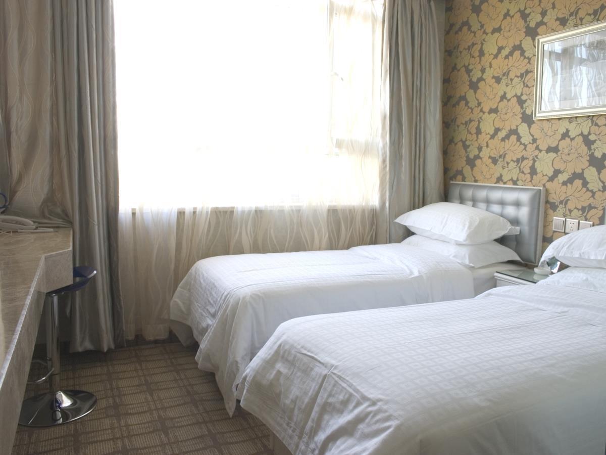Xinyijia City Hotel ウルムチ市 エクステリア 写真